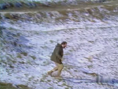 Charles plunges down the snow covered hillside