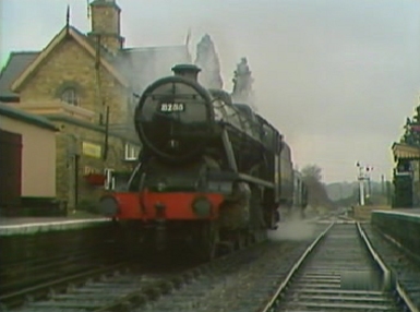 The steam train arrives at a station