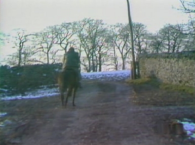 Charles flees on horseback as the riders close in